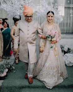 This beautiful intimate Delhi Wedding is full inspiration of Stunning outfits, Cute couple poses and bridal portraits ideas. #shaadisaga #indianwedding #redlehenga #redlehengas #weddingoutfits #engagementoutfits #engagementlehenga #kurtaforgrooms #kurtaforgroom #Haldioutfits #haldioutfitforbrides #yellowsareeforbrides #pinklehenga #pinklehengas #sangeetlehengas #sangeetoutfitsforcouples #bridallehengas #weddingdecor #manishmalhotra #pinklehenga #purplegown #mehendilehenga #weddinglehenga #pink Bride Entry Ideas, Pictures Of Couples, Poses Funny, Couple Entry, Photos Of Bride, Romantic Poses, Groom Entry