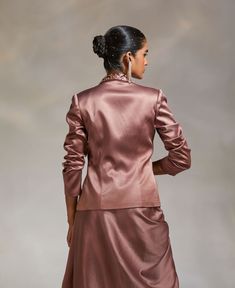 Editor's Note Style a traditional look with a solid lapel jacket with hand embroidery detailing Note: Blouse and skirt worn by model is for styling purposes only. Color: Mauve Fabric: Heavy Satin Fit type: Tailored Components: Jacket Occasion: Party Care: Dry Clean Only About the Designer The crux and essence of the label, Divya Aggarwal, is to challenge and revamp the face of ordinary traditional wear while being customer oriented. Driven by the values of individuality and creativity, this cont Divya Aggarwal, Mauve Fabric, Blouse Yoke, Personal Shopping Service, Notes Style, Embroidery Detailing, Lapel Jacket, Traditional Look, Modern Vibe