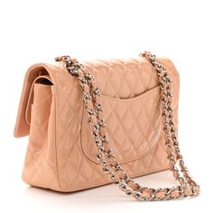 This is an authentic CHANEL Patent Quilted Medium Double Flap in Light Pink. This stunning shoulder bag is crafted of fine diamond quilted patent leather in light pink. The bag features silver chain link shoulder straps threaded with patent leather and a front flap with a silver Chanel CC turn lock. This opens to an inner flap and matte pink leather interior with patch pockets. Jersey Quilt, Classic Phones, Chanel Double Flap, Chanel Crossbody, Chanel Tweed, Chanel Flap Bag, Quilted Wallet, Chanel Shoulder Bag, Matte Pink