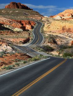 an empty road in the middle of nowhere