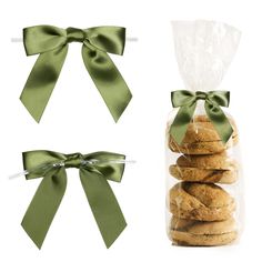 cookies wrapped in green ribbon and tied with satin ribbons, next to a bag of cookies