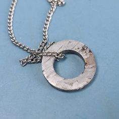 Diameter: 0.55 in Inner diameter: 0.31 in Thickness: 0.07 in This item is sold in one piece. The actual product matches the photo. Cheap Round Pendant Jewelry With Adjustable Cord, Iron Meteorite, Necklace Gift, Single Piece, Gift Necklace, Bathing Beauties, Electronic Accessories, One Piece, Pendant Necklace