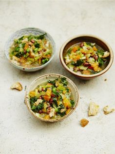 three bowls filled with different types of food