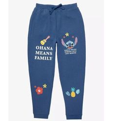 Disney Lilo Stitch Sweatpants Adult Large Blue Lounge Joggers Ohana Means Family Stitch is here to remind you that you'll never be left behind! The adorable Disney "dog" appears alongside "Ohana means family, family means nobody gets left behind" lettering. Also features floral details for a tropical touch. A BoxLunch Exclusive! 34-36" waist 60% cotton; 40% polyester Listed in unisex sizes Wash cold with like colors; dry low Stitch Ohana Means Family, Lilo And Stitch Ohana, Stitch Sweatshirt, Lilo And Stitch Drawings, Cute Sweatpants, Blue Lounge, Stitch Clothes, Disney Dogs, Ohana Means Family