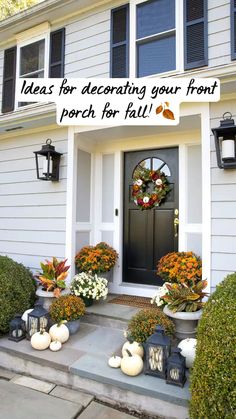 front porch decorated for fall with pumpkins and flowers