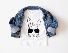 Easter Shirts For Kids Boys, Unisex Cute Shirt For Spring, Cute Unisex Shirt For Spring, Cute Unisex White Shirt, Playful Pre-shrunk Shirt For Spring, Unisex White Shirt With Funny Print, Playful White Tops For Easter, White Playful T-shirt For Easter, Playful White T-shirt For Easter