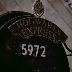 the hogwart's express logo is on top of a mailbox