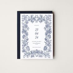 a blue and white wedding card with the number twenty four printed on it's front