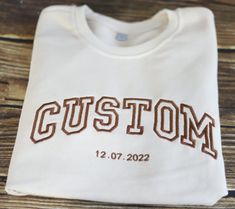 It's the perfect gift for him/her! Our embroidery skills are superb, so you can buy with confidence! Customize your own exclusive embroidered sweatshirt. For the sake of beauty so we only support the customization of capital letters. If you feel that the font does not meet your needs, you can contact me via chat or even submit your design and I will communicate with you and find a way to complete your idea. For those who have trouble choosing, we offer a small (but common) selection of embroider Varsity Sweatshirt With Letter Embroidery For College, White Collegiate Sweatshirt With Custom Embroidery, Casual College Sweatshirt With Custom Embroidery, Collegiate Letter Embroidery Sweatshirt For College, Customizable White Hoodie For College, Varsity Sweatshirt With Custom Embroidery For Fall, Custom Embroidered Crew Neck Hoodie For College, Varsity Sweatshirt With Custom Embroidery For Streetwear, White Varsity Sweatshirt With Embroidered Graphics