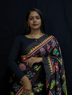 Weaver communities of Maniabandha and Nuapatana of Odisha traditionally weave this kind of saree. Common motifs are star, temple, conch, rudraksh, fish, chakra, lotus etc. The inspiration of all its designs comes from nature. It is the best of single ikat; one of warp and weft is tied and dyed prior to weaving. The borders and the pallas have tremendous variety and each one of them is attractive and praiseworthy. Specification:  Occasion: Festive Wear Fabric: Mulberry Silk,  Primary Color: Black Traditional Multicolor Pre-draped Chanderi Saree, Multicolor Motif Pre-draped Saree For Puja, Multicolor Pre-draped Saree With Motifs For Puja, Multicolor Ikat Print Pre-draped Saree For Navratri, Traditional Multicolor Pre-draped Saree For Navratri, Black Kalamkari Print Saree For Diwali, Multicolor Pre-draped Saree With Printed Border For Puja, Black Kalamkari Saree For Navratri, Black Saree With Kalamkari Print For Navratri