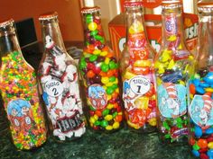 there are many different types of candy in the bottles