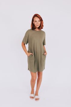 This olive green Wise Decision Dress is perfect for any occasion! Look put-together and stay comfortable with its soft tee shirt fabric and convenient pockets - no more having to juggle your keys, phone, wallet, and other essentials. Plus, with its timeless style you can always make a "wise decision" to wear it again and again! Details Crew neck Short sleeve Pockets! Lightweight Sizing Approximate measurements: SIZE LENGTH BUST Small 37” 42” Medium 37” 44” Large 37” 46” Fabric has stretch Model Green Cotton Casual T-shirt Dress, Casual Solid Dresses For Everyday, Casual Solid Everyday Dress, Summer Crew Neck Dresses With Side Pockets, Summer Dresses With Crew Neck And Side Pockets, Summer Dresses With Side Pockets And Crew Neck, Casual Crew Neck Dress With Side Pockets, Casual Relaxed Fit T-shirt Dress For Everyday, Casual Everyday T-shirt Dress With Relaxed Fit