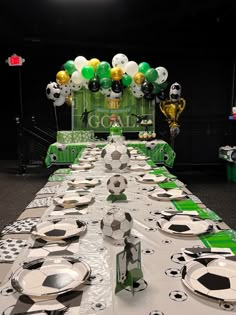 a table set up for a soccer themed party