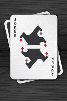 two playing cards with the joker logo on them