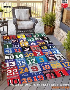 a colorful area rug with numbers and letters on the front porch, next to a chair