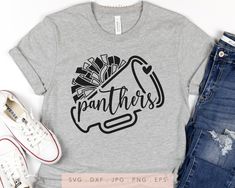 a t - shirt with the word panther on it next to ripped jeans and sneakers