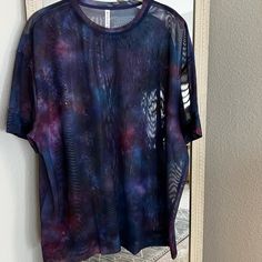 Size Medium. New With Tags! See Through With A Super Nova Galaxy Print. Could Be Great As A Swim Cover Up. Approximate Measurements (Laying Flat): Bust: 26” Length: 29” Purple Crew Neck T-shirt For Workout, Purple Athleisure T-shirt For Sports, Summer Oversized Workout Activewear, Summer Oversized Activewear For Workout, Blue Summer Gym T-shirt, Oversized Short Sleeve Activewear For Summer, Oversized Crew Neck Activewear For Summer, Purple Sporty Workout T-shirt, Sporty Purple Workout T-shirt