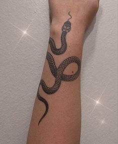 a person with a tattoo on their arm