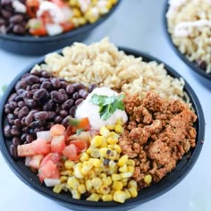 three bowls filled with different types of food