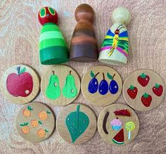 wooden toys are laid out on the floor to be used as magnets for children's crafts