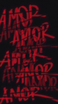 the words are written in red and black on a dark background with some type of writing