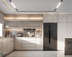 a modern kitchen with marble counter tops and white cabinets