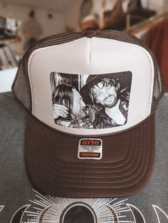 Ride in style with the iconic Waylon and Willie Trucker Hat. This unique hat features the legendary country music duo and adds a touch of personality to any outfit. Perfect for classic music lovers! Please Note* Most orders ship out within 3 business days. Occasionally it can take up to 14 days to ship depending on inventory Retro Snapback Hats For Country Events, Vintage Trucker Hat For Country Events, Retro Trucker Hat For Country Events, Vintage Snapback Trucker Hat For Country Events, Retro Adjustable Trucker Hat For Country Events, Vintage Style Trucker Hat For Rodeo, Vintage Trucker Hat For Rodeo, Vintage Snapback Hat For Rodeo, Retro Snapback Hats For Rodeo