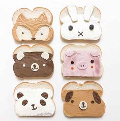 four slices of bread with different animals on them