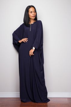 "Navy Blue Kaftan Dress, Maxi Dress, Long boho dress, Loose fit dress, Modest dress, Dark Blue kaftan with pockets PRODUCT SIZE : One Size Fits Most * Chest : free up to 58\" * Waist : free up to 58\" * Hips : free up to 58\" * Circumference bottom hem : 45\" * Length : 56\" * Sleeve length : 23\" MATERIAL * Spandex Venetia * Zipper on the back MODEL : * Model chest : 32\", Height 160 cm (5.2) without high heel * Accessories excluded Produced by NUICHAN IMPORTANT NOTE *Please note that colours s Long Blue Boho Dress, Casual Long Blue Abaya, Blue Long Dress For Eid, Blue Tunic Dress Free Size, Blue Free Size Tunic Dress, Blue Tunic Free Size Dress, Long Flowy Blue Boho Dress, Blue Embroidered Maxi Dress For Eid, Elegant Blue Free Size Dress