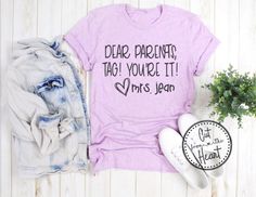 This listing includes one UNISEX short sleeve t-shirt PERSONALIZED just with teacher name or school name. We know all the teachers are counting the days till summer break.. This is such a cute shirt for the last month of school or graduation. This also makes the perfect end of year gift for your favorite teacher... We absolutely love this brand of tee's... They will not shrink and hold up great for daily wear. The material is incredibly soft and the design is dyed into the fabric. No more peelin Short Sleeve T-shirt With Name Print For Teacher Appreciation, Casual T-shirt With Custom Text For School, Casual Tops With Custom Text For School, Casual School Tops With Custom Text, School Cotton Tops With Custom Text, Cut Tank Top, Dear Parents, End Of School, Soccer Shirts