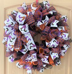 a halloween wreath on the front door