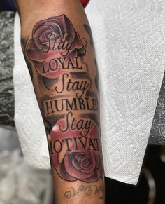 a person with a tattoo on their arm that says stay joy, stay humble