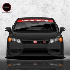 the front end of a black honda racing car with red and white lettering on it