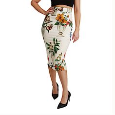 Dolce & Gabbana Multicolor Silk Stretch Flower Vase Skirt Gorgeous Brand New With Tags, 100% Authentic Dolce & Gabbana Skirt. Model: Midi Length, High Waist Color: White With Multicolor Floral Print Zipper Closure Silk Stretch Inner Lining Logo Details Made In Italy Material: 94% Silk 6% Elastane Lining: 96% Silk, 4% Elastane Elegant Floral Print Party Bottoms, Elegant Multicolor Floral Print Bottoms, Elegant Floral Print Party Skirt, Elegant Floral Print Skirt For Party, Elegant Multicolor Spring Skirt, Elegant Multicolor Skirt For Spring, White Floral Print Party Bottoms, Feminine Fitted Floral Print Bottoms, Fitted Feminine Floral Print Bottoms