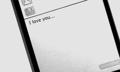 a cell phone with the text i love you written on it's display screen