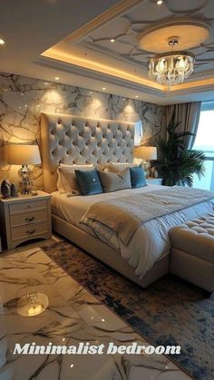 a large bed sitting in the middle of a bedroom under a chandelier above a window