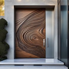 a modern door with wood carving on it