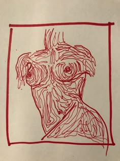 a drawing of a man's face in red on white paper with lines drawn across it