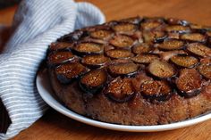 a cake on a plate with chocolate toppings