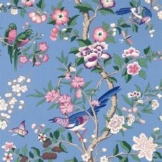 a blue wallpaper with birds and flowers on it