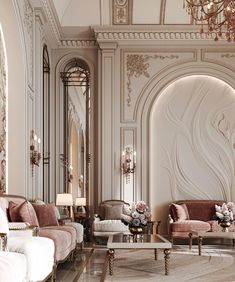 an elegant living room with fancy furniture and chandelier