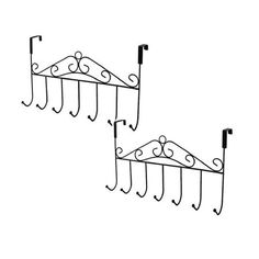 two black iron wall mounted coat racks with hooks on each side and one hanging over the other