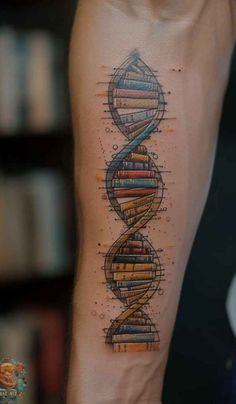 a tattoo on the arm with books and a spirally shaped structure in it's center