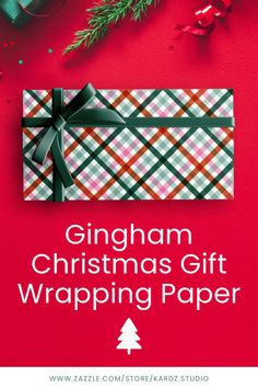 a christmas gift wrapping paper on top of a red background with presents and fir branches