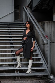 Woman wearing a casual winter outfit: Grey Knit Wrap Dress, White Boots, Black Tights Dress Work Outfit, Fancy Dress Outfits