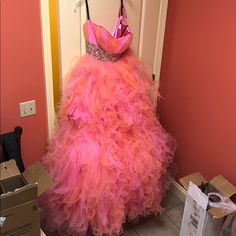 Pink Gown For Pageant During Prom Season, Pink Strapless Prom Gown, Pink Tulle Evening Dress For Pageant, Pink Pageant Dress For Prom Season, Pink Dress For Prom Season Pageant, Pink Tulle Evening Dress For Pageants, Pink Dress For Pageant And Prom Season, Pink Strapless Ball Gown For Prom Season, Pink Floor-length Evening Dress For Quinceanera