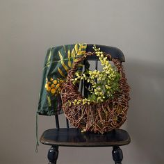 a chair with a wreath on top of it