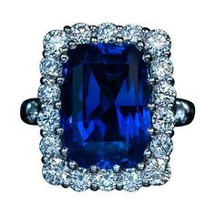 An 11.51 ct old mine cut Ceylon sapphire of a vivid blue color is set in a modern platinum and diamond ring. The diamonds are bright white and clean: F-G color, VS clarity. Total diamond weight is 1.61 ct. The sapphire and diamond cluster measures 19 x 15 mm (11/16 x 9/16 in.) Ring size 7 (17 mm) sizable Weight is 14.55 grams. The ring is accompanied by the AGL Prestige Gemstone Report 1113777 for the sapphire. Round Diamond Setting, Platinum Diamond Rings, Ceylon Sapphire, Jewels Rings, Golden Ring, Sapphire Diamond Ring, Minerals And Gemstones, Platinum Ring, Sapphire Jewelry