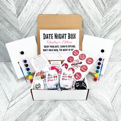 the date night box is packed with various items