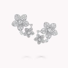 Inspired by the untamed beauty of an English garden, the Wild Flower double diamond earrings in white gold feature pairs of diamond blossoms, each uniquely rendered down to the last petal. Bursting with life and arranged with carefree charm, round diamond accents are set to sparkle among the blooms. The Wild Flower collection is an invitation to escape into a garden that grows just for you. From trios and individual blooms to floral clusters and blossoms laid out in a row, each Wild Flower jewel Large Diamond Stud Earrings, Large Diamond Rings, Graff Diamonds, Flower Diamond Ring, Expensive Diamond, Pave Diamond Earrings, Flower Collection, Double Diamond, Diamond Jewelry Necklace